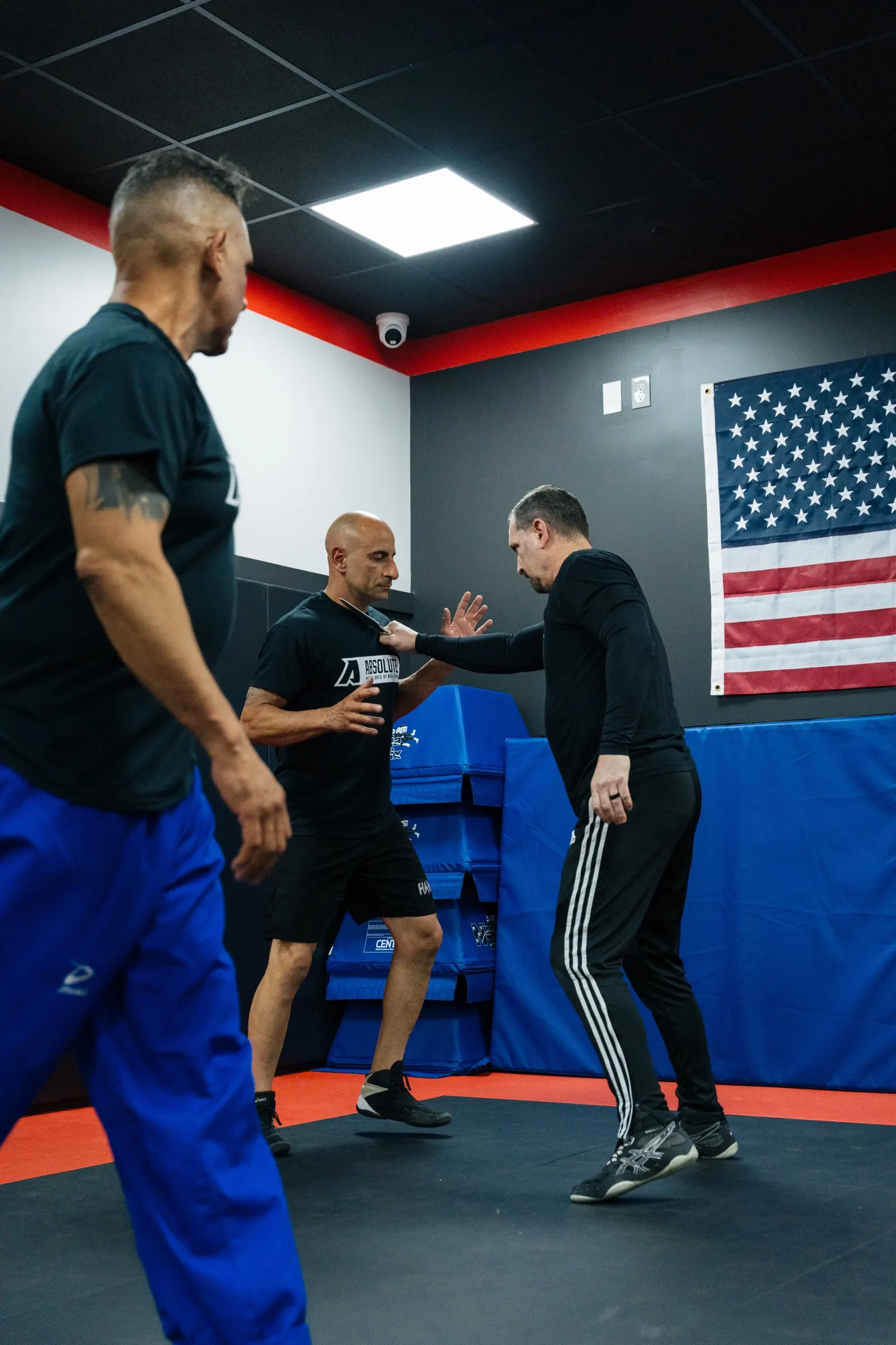 Master Mike teaching wrist defense in the dojo