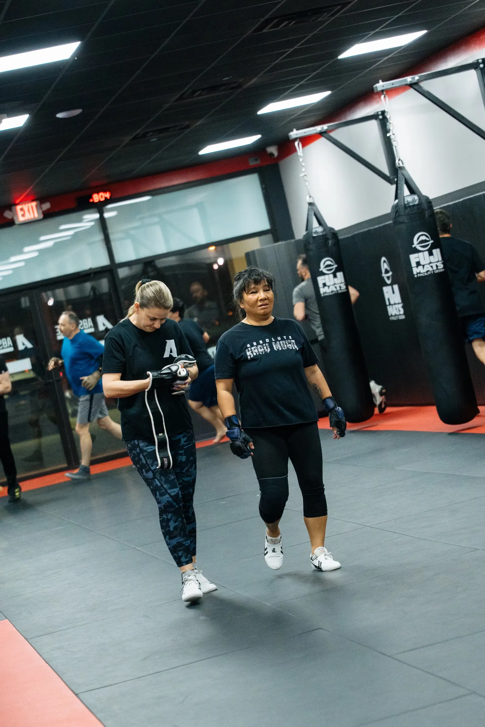 Instructor Lexi suiting up for class